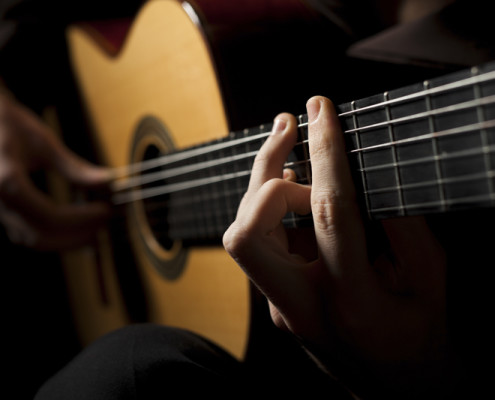 Man playing acoustic guitar